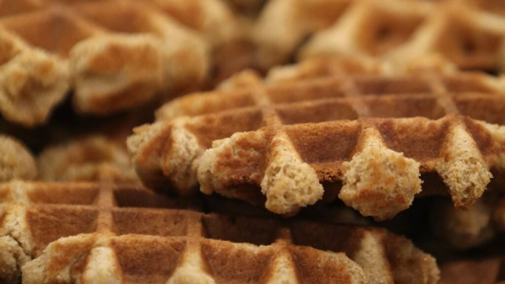 Tiny Waffle Makers, Serious Weekend Breakfasts Pile of waffles made with the best waffle maker for small kitchens